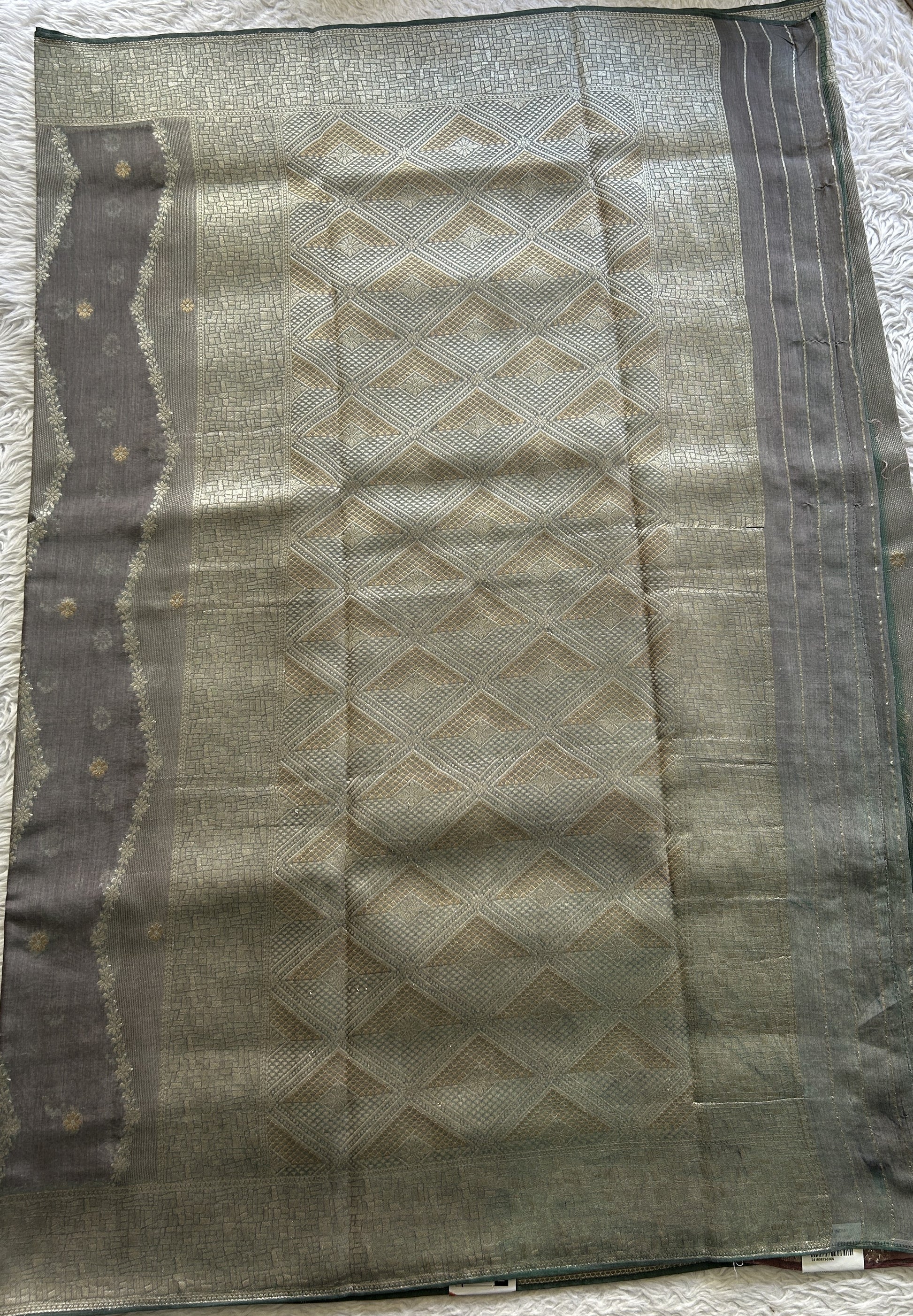 Semi Georgette Saree Fossil Colored Elegantly Paired with a Zari Border. - Sampradaya Designer Studio