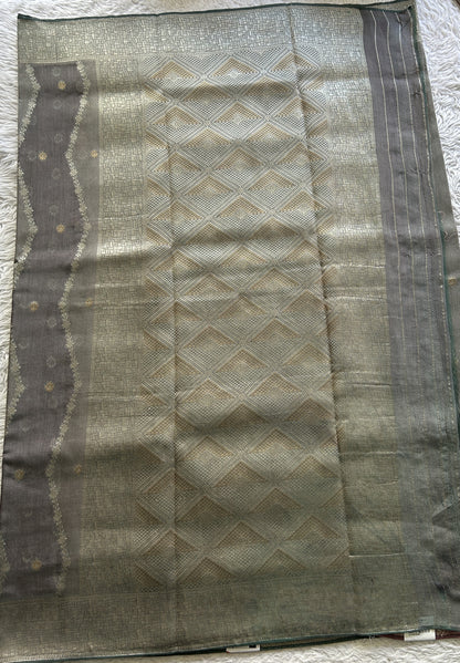 Semi Georgette Saree Fossil Colored Elegantly Paired with a Zari Border. - Sampradaya Designer Studio