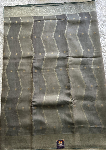 Semi Georgette Saree Fossil Colored Elegantly Paired with a Zari Border. - Sampradaya Designer Studio