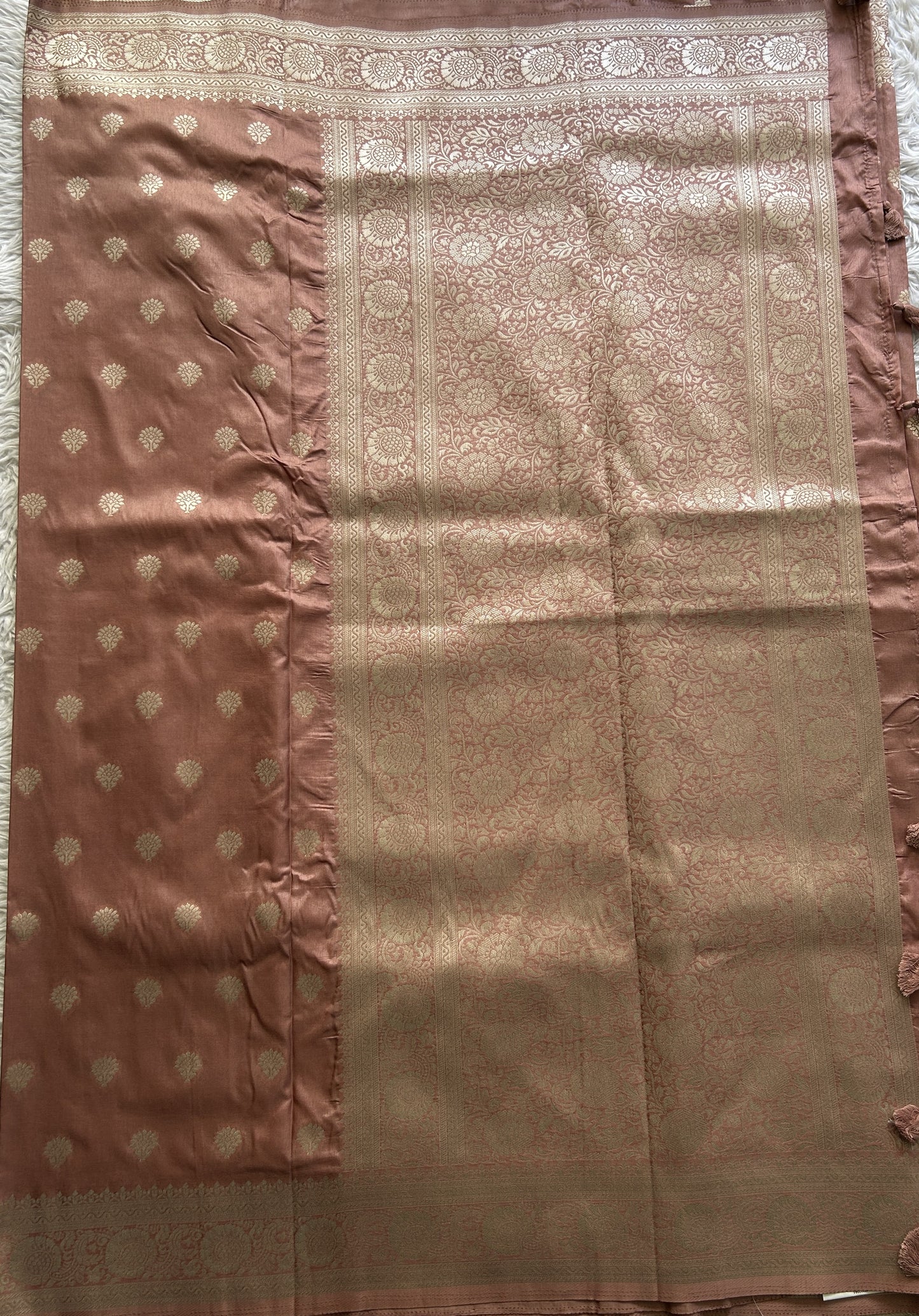 Semi Georgette Saree Light Peach Colored Elegantly Paired with a Zari Border. - Sampradaya Designer Studio