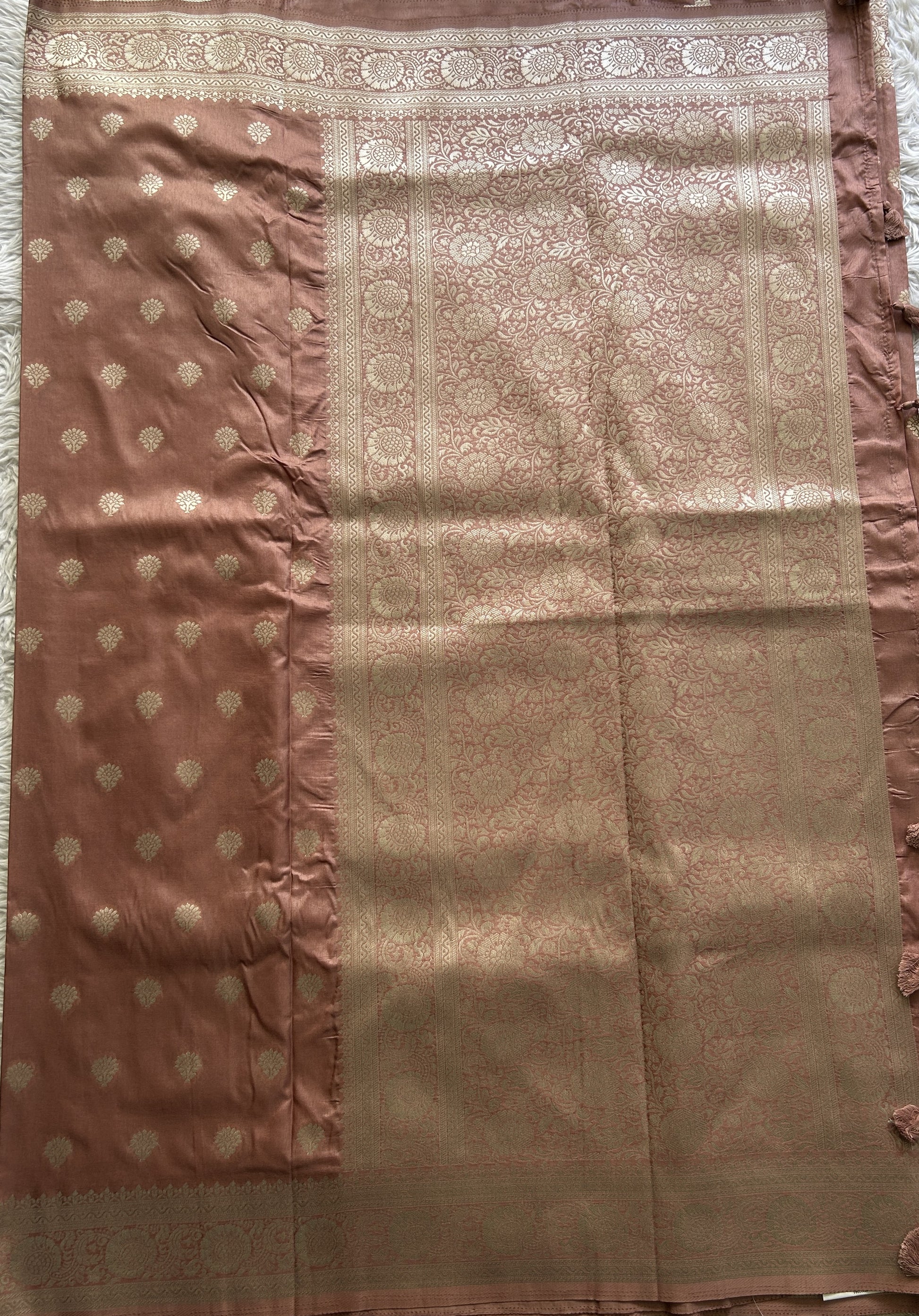 Semi Georgette Saree Light Peach Colored Elegantly Paired with a Zari Border. - Sampradaya Designer Studio