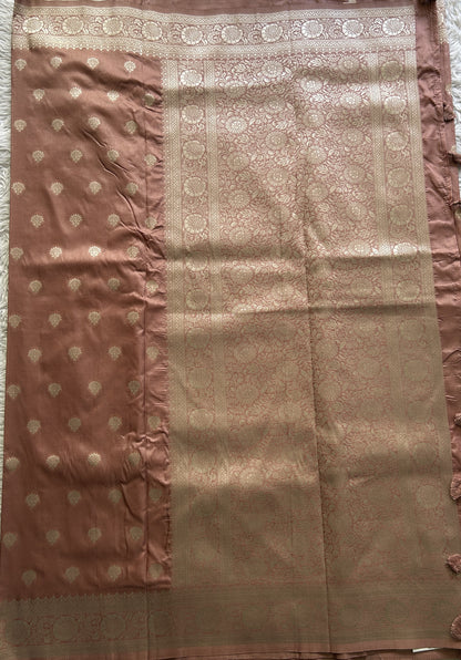 Semi Georgette Saree Light Peach Colored Elegantly Paired with a Zari Border. - Sampradaya Designer Studio