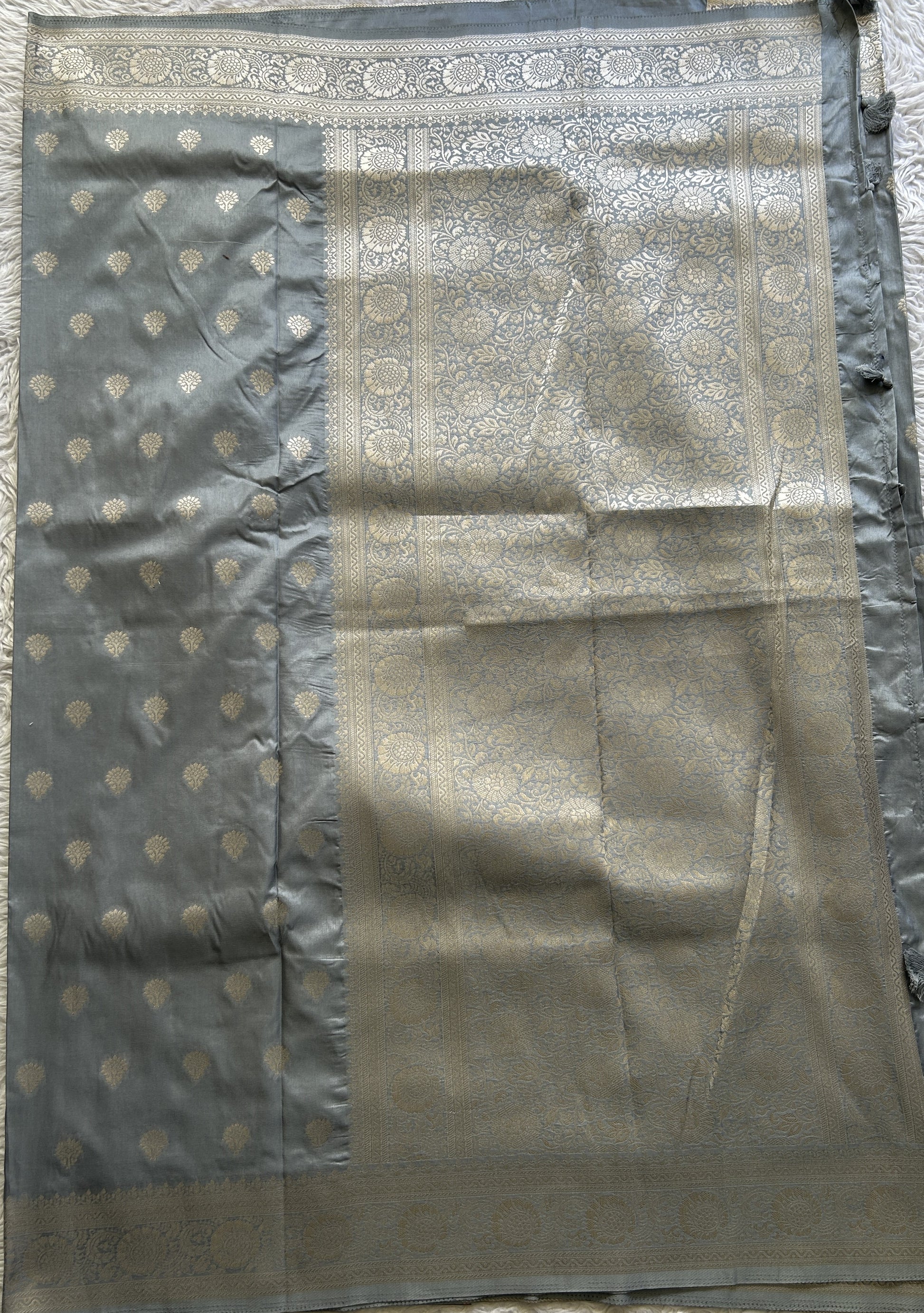 Semi Georgette Saree Gray Colored Elegantly Paired with a Zari Border. - Sampradaya Designer Studio