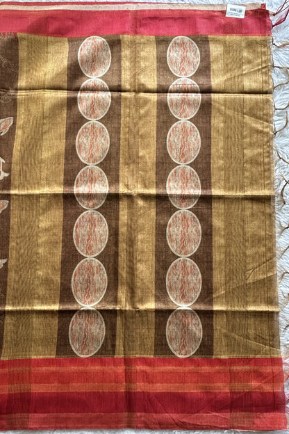 Semi Tussar Saree Brown colored complemented with a Red Color Zari Border. - Sampradaya Designer Studio
