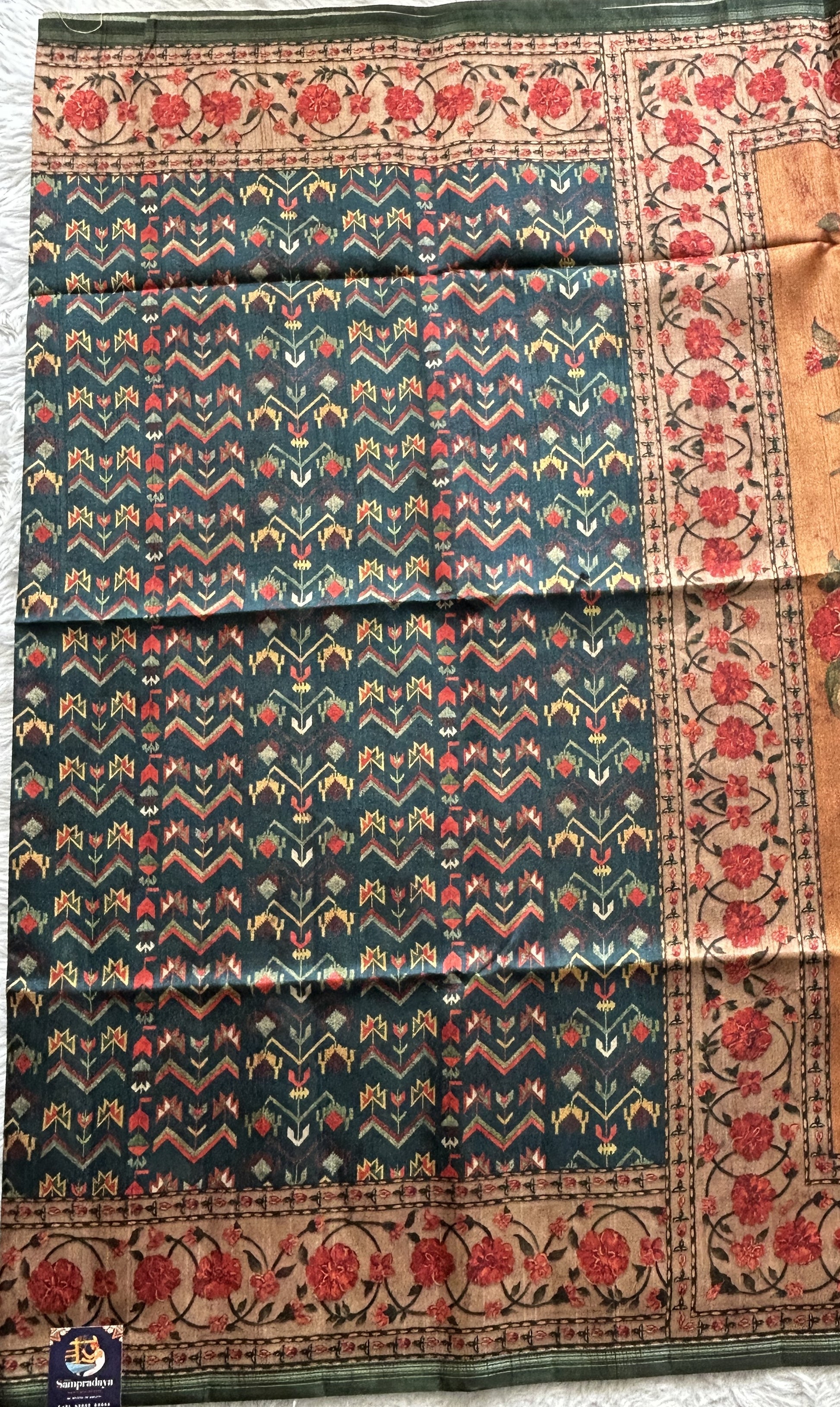 Semi Tussar Saree Turquoise Blue colored complemented with a Floral Print Border. - Sampradaya Designer Studio