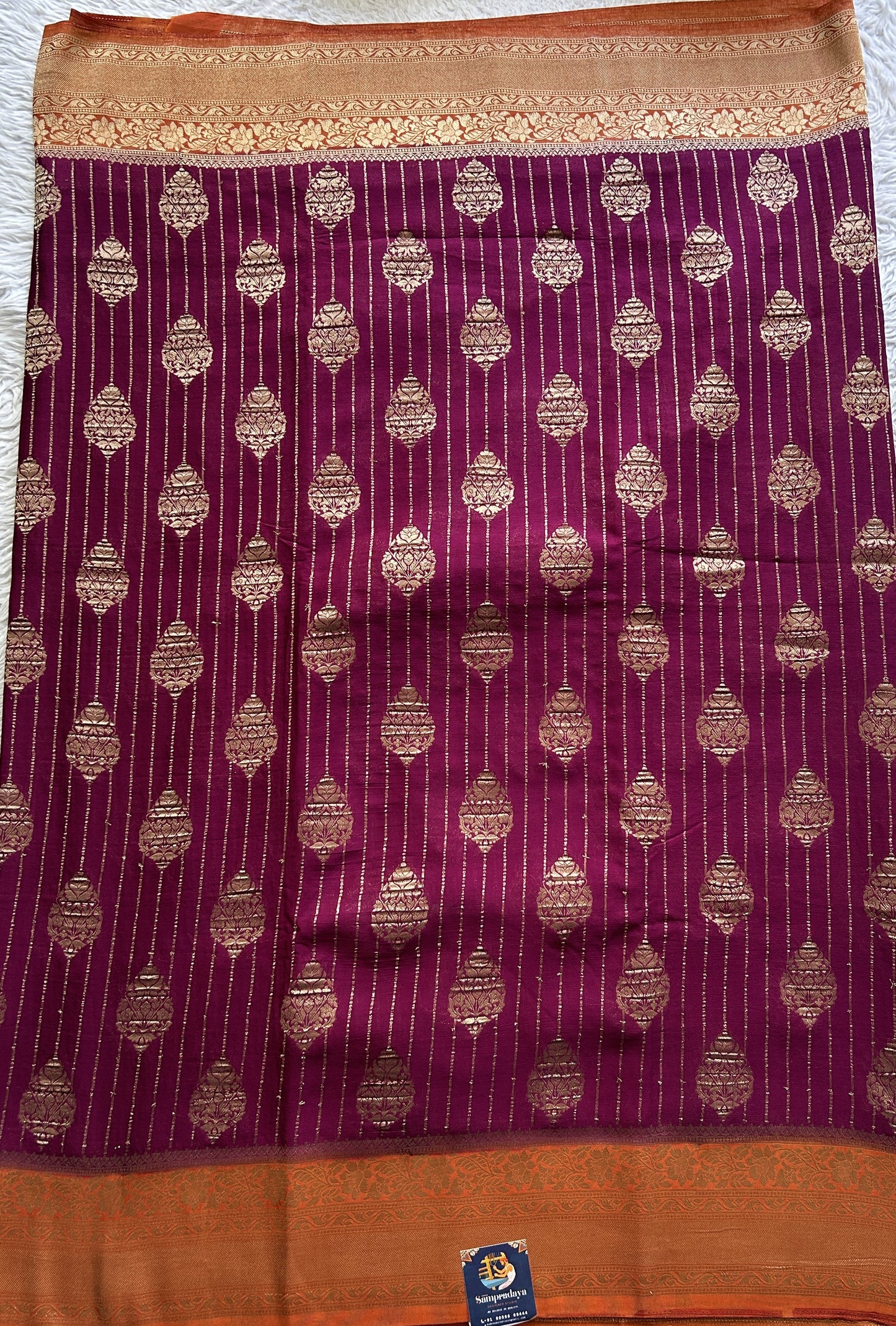 Semi Georgette Saree Purple Colored Elegantly Paired with a Zari Border. - Sampradaya Designer Studio