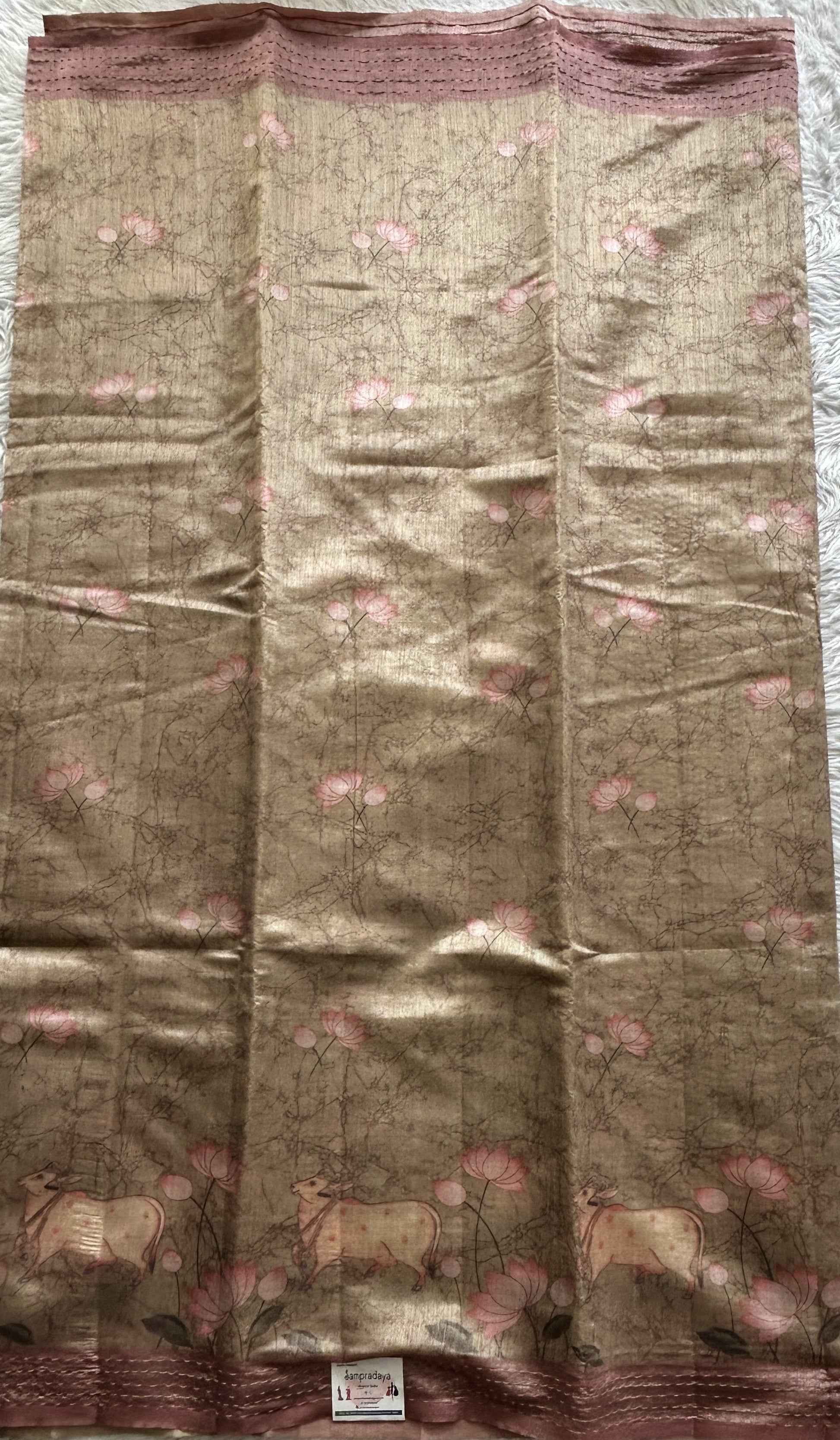 Semi Tussar Saree Beige Colored complemented with a Baby Pink Color Running Stich Border. - Sampradaya Designer Studio