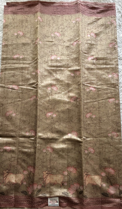 Semi Tussar Saree Beige Colored complemented with a Baby Pink Color Running Stich Border. - Sampradaya Designer Studio
