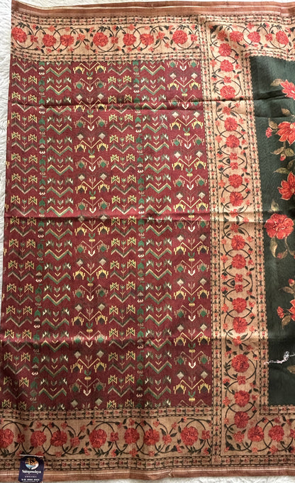 Semi Tussar Saree Bottle Green Colored complemented with a Floral Print Border. - Sampradaya Designer Studio