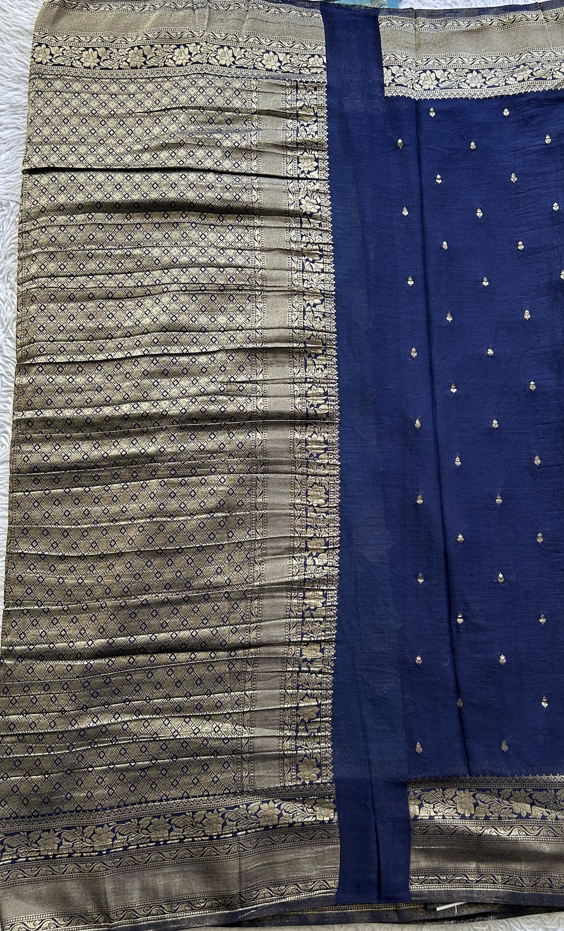 Semi Georgette Saree Sea Blue Colored Elegantly Paired with a Zari Border. - Sampradaya Designer Studio