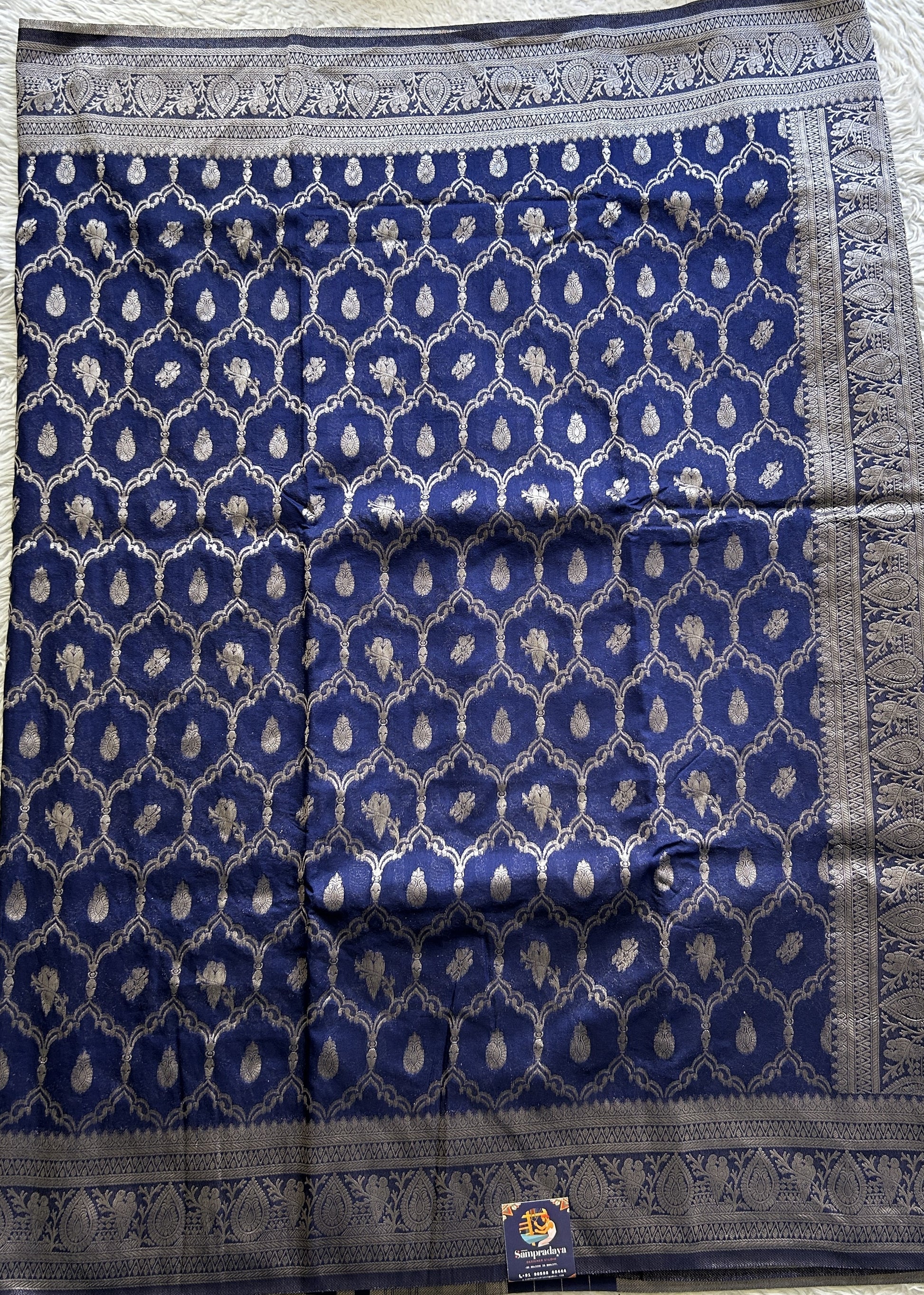 Semi Georgette Saree Dark Blue Colored Elegantly Paired with a Zari Border. - Sampradaya Designer Studio