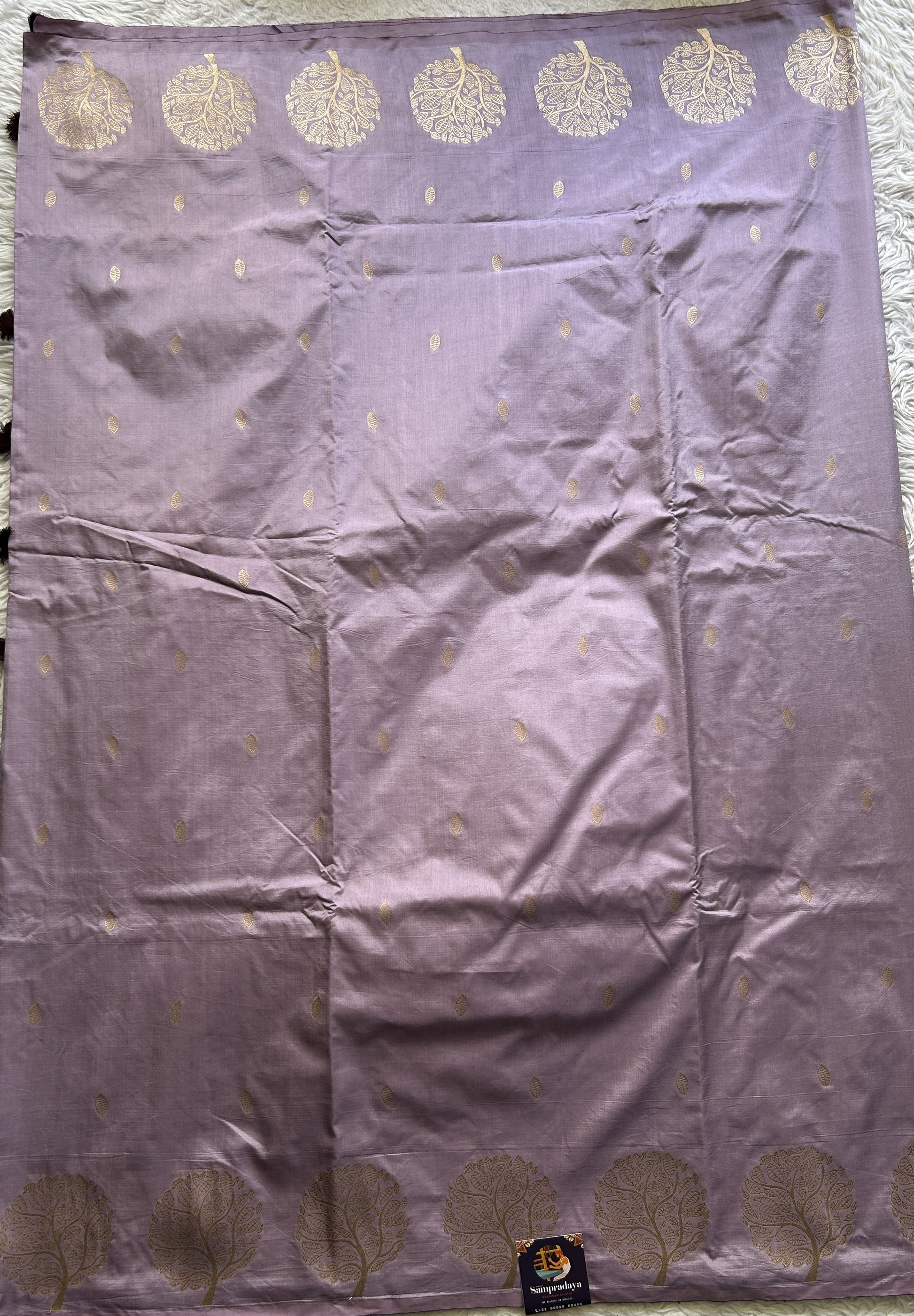 Mona Silk Saree Lavender Colored Paired with a Buti Border. - Sampradaya Designer Studio