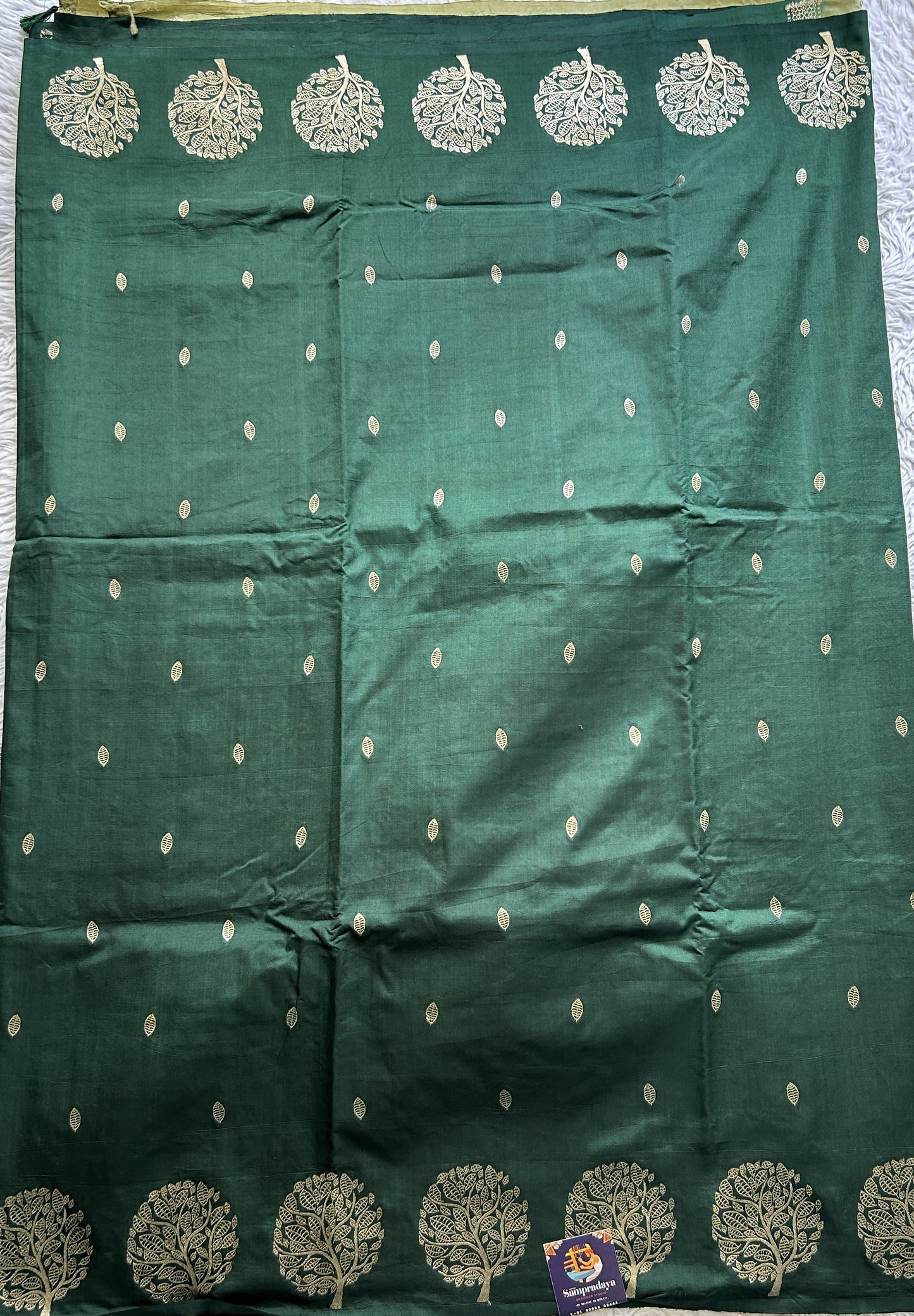 Semi Georgette Saree Green Colored Paired with a Zari Border. - Sampradaya Designer Studio