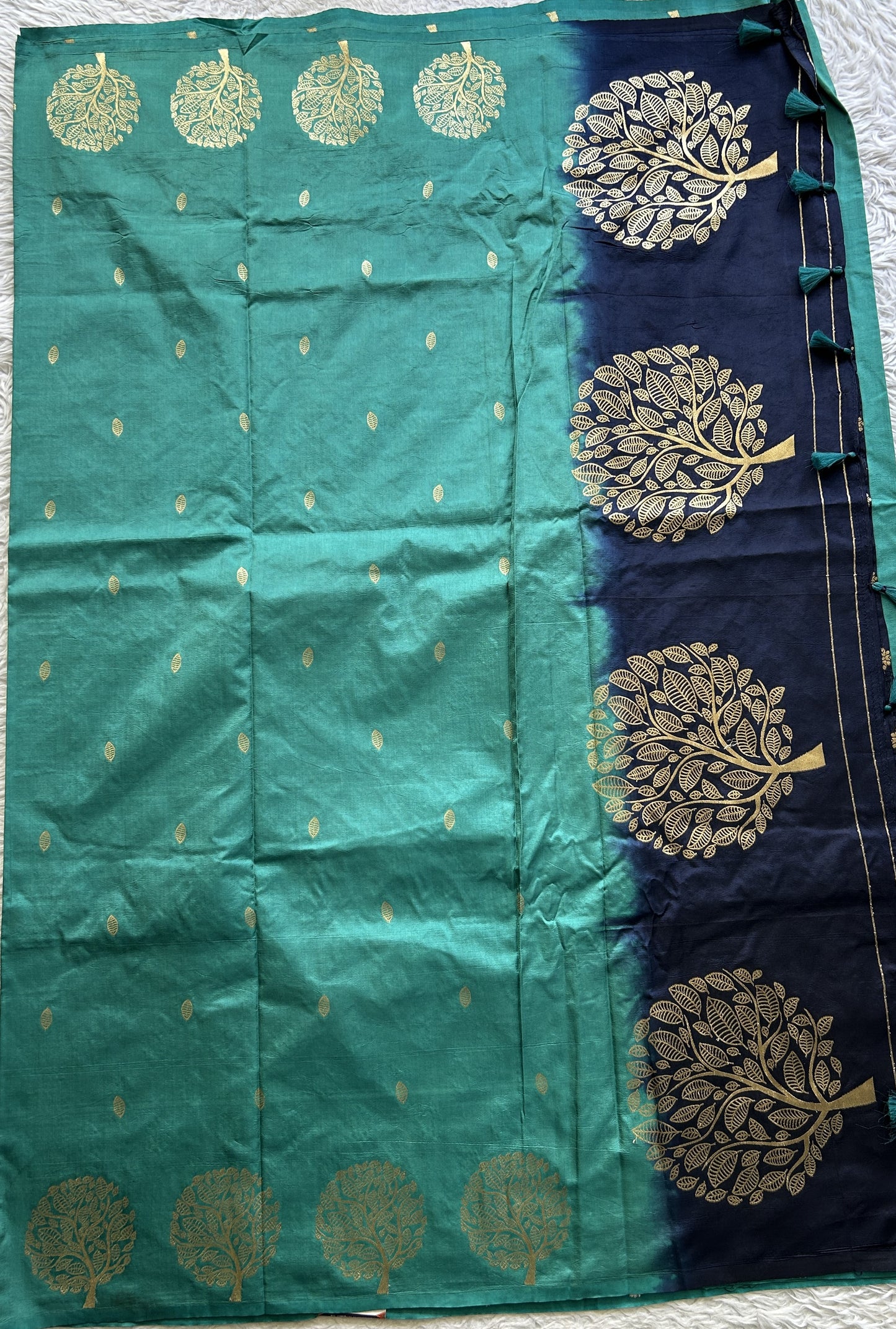 Mona Silk Saree Turquoise Green Colored Paired with a Buti Border. - Sampradaya Designer Studio