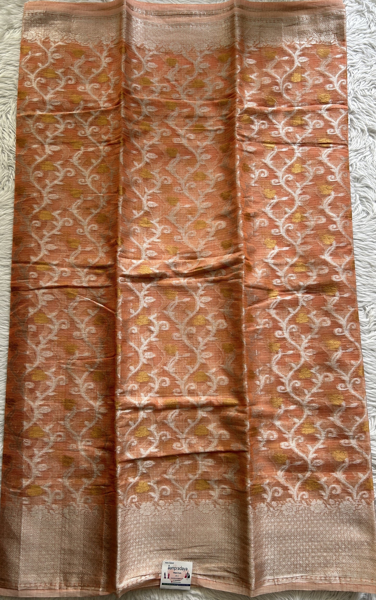 Cotton Kota Saree Orange Colored Complemented with a Zari Border. - Sampradaya Designer Studio