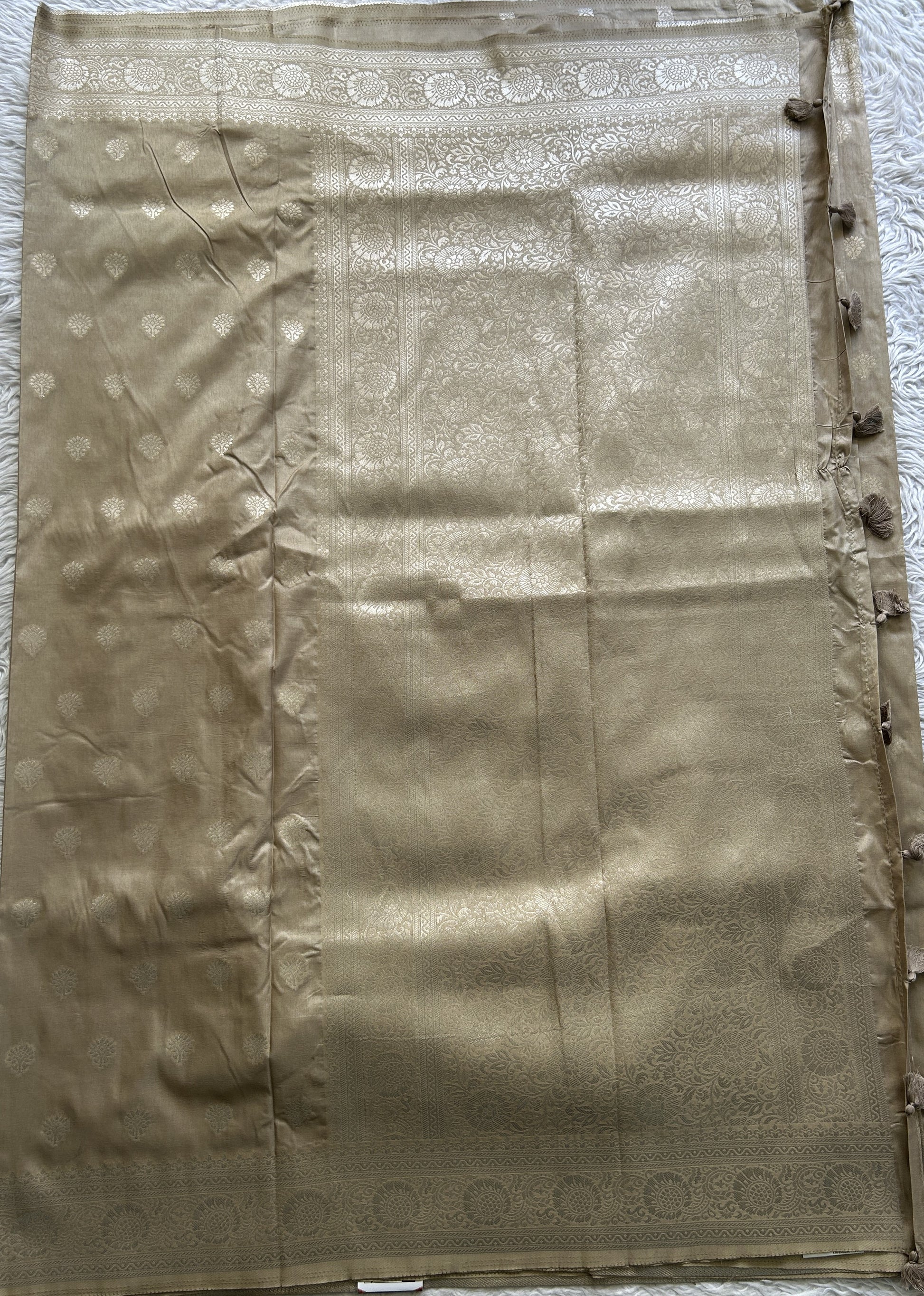 Semi Georgette Saree Beige Colored Paired with a Zari Border. - Sampradaya Designer Studio