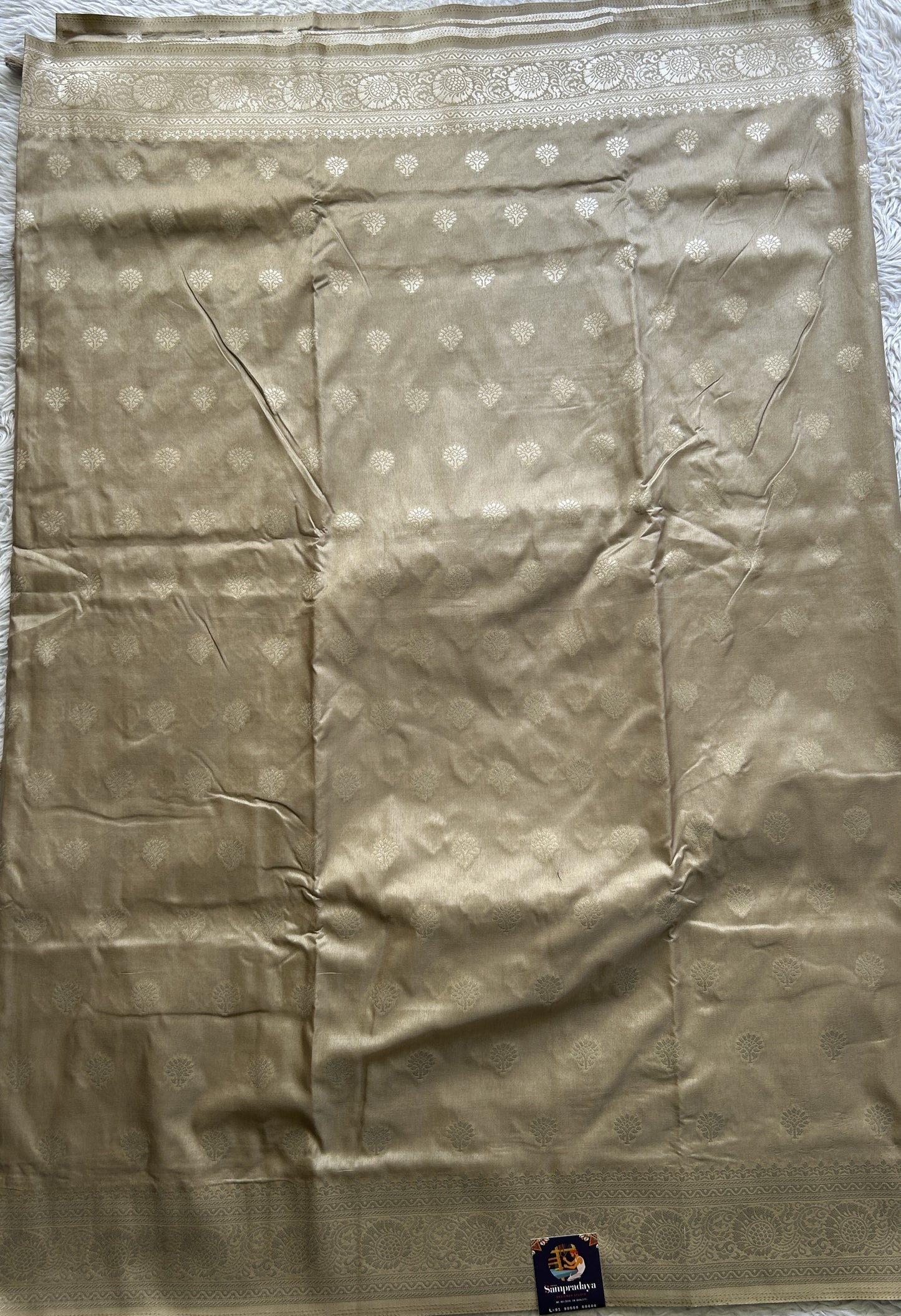 Semi Georgette Saree Beige Colored Paired with a Zari Border. - Sampradaya Designer Studio