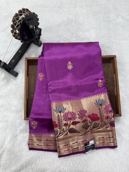 Pure Chiniya Silk Saree Striking Purple Colored Elegantly Paired with a Gold Zari Border.
