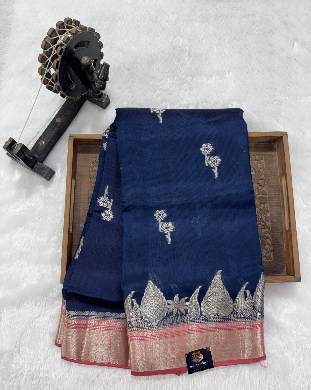 Pure Chiniya Silk Saree Navy Blue Colored Elegantly Paired with a Gold Zari Border.