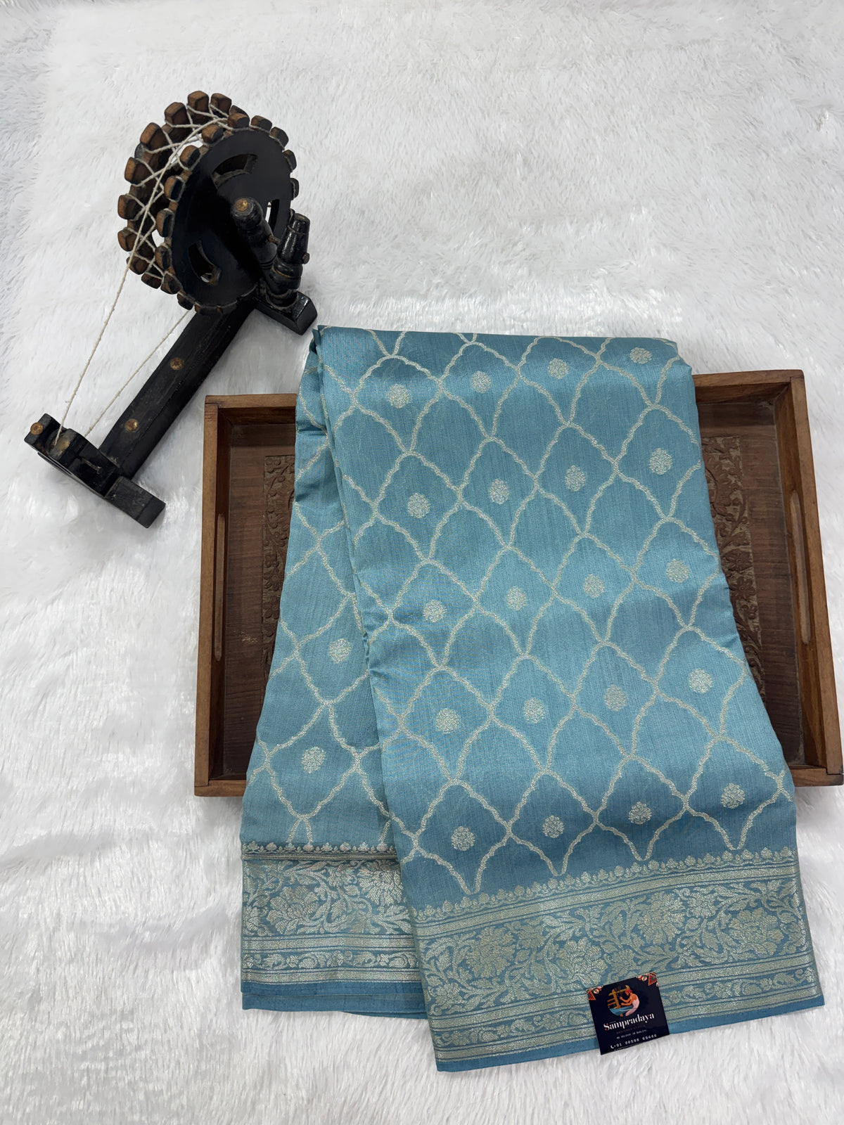 Pure Chiniya Silk Saree Ice Blue Colored Elegantly Paired with a Gold Zari Border