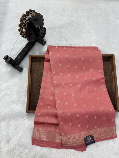 Pure Chiniya Silk Saree Peach Colored Elegantly Paired with a Gold Zari Border.