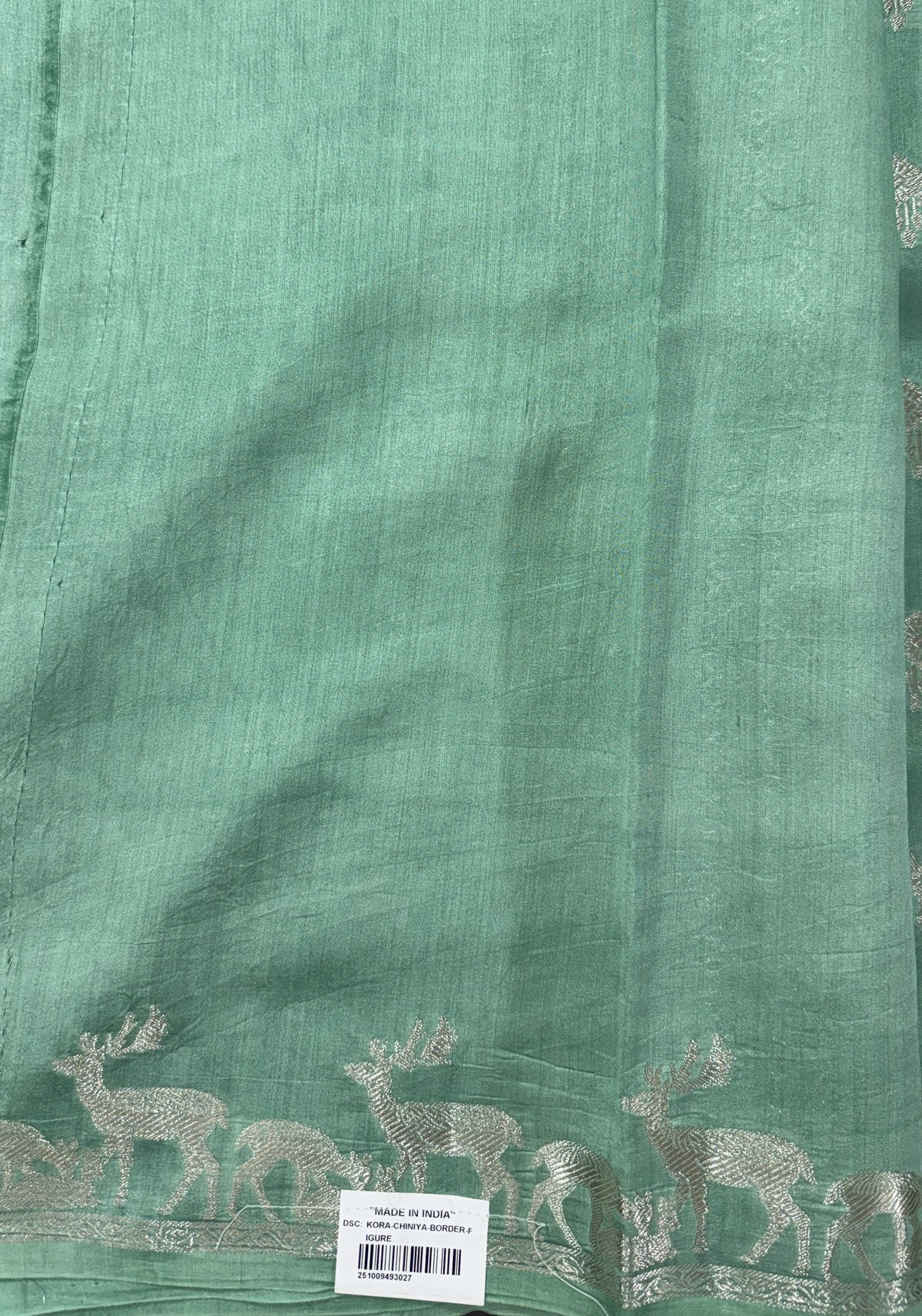 Pure Chiniya Silk Saree Sea Green Colored Elegantly Paired with a Gold Zari Border.