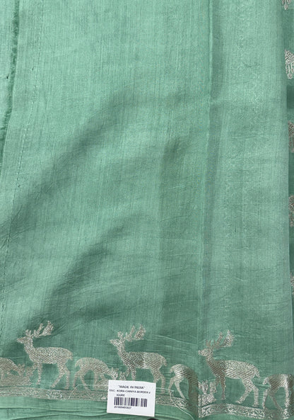 Pure Chiniya Silk Saree Sea Green Colored Elegantly Paired with a Gold Zari Border.