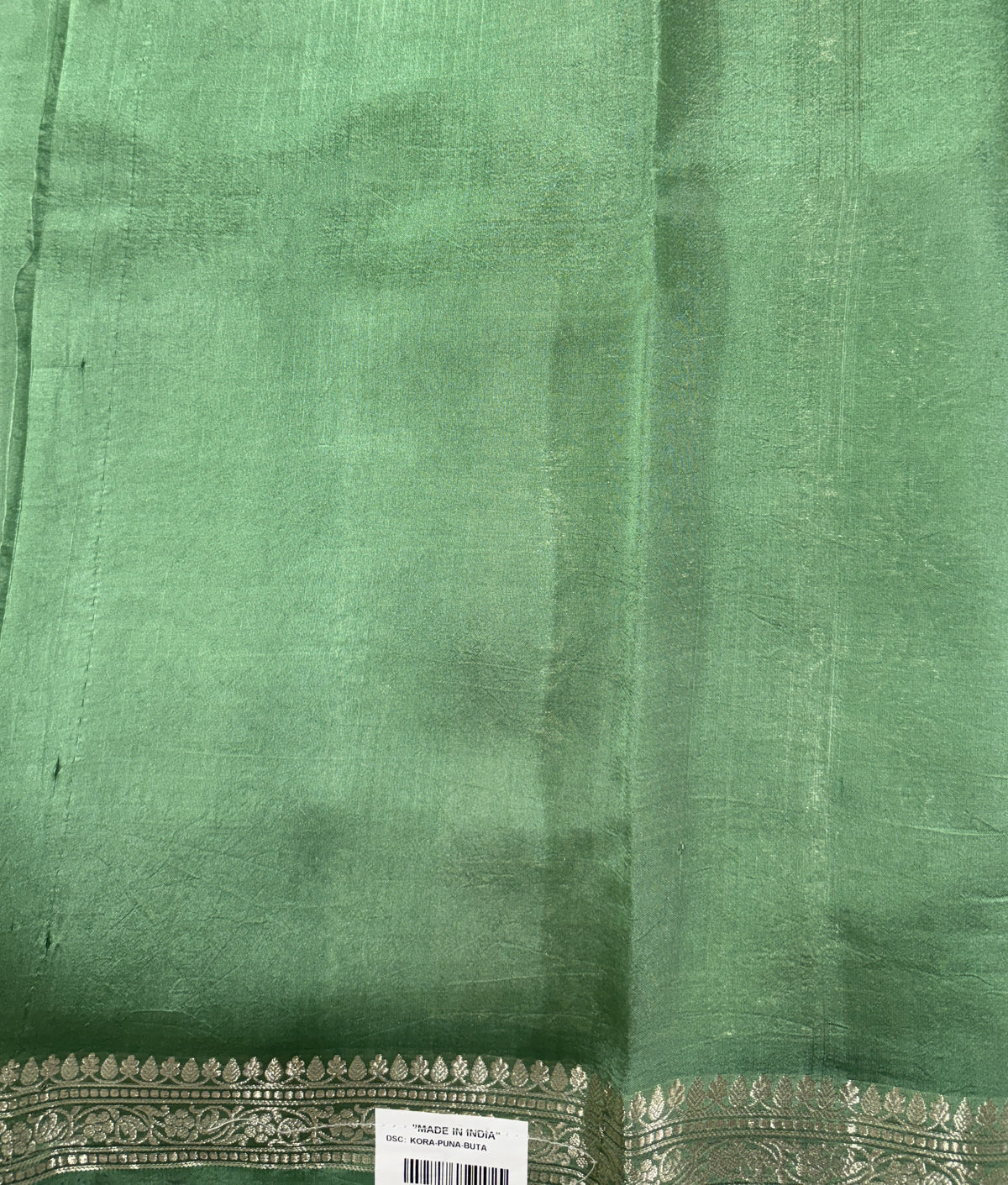 Pure Chiniya Silk Saree Sea Green Colored Elegantly Paired with a Gold Zari Border.