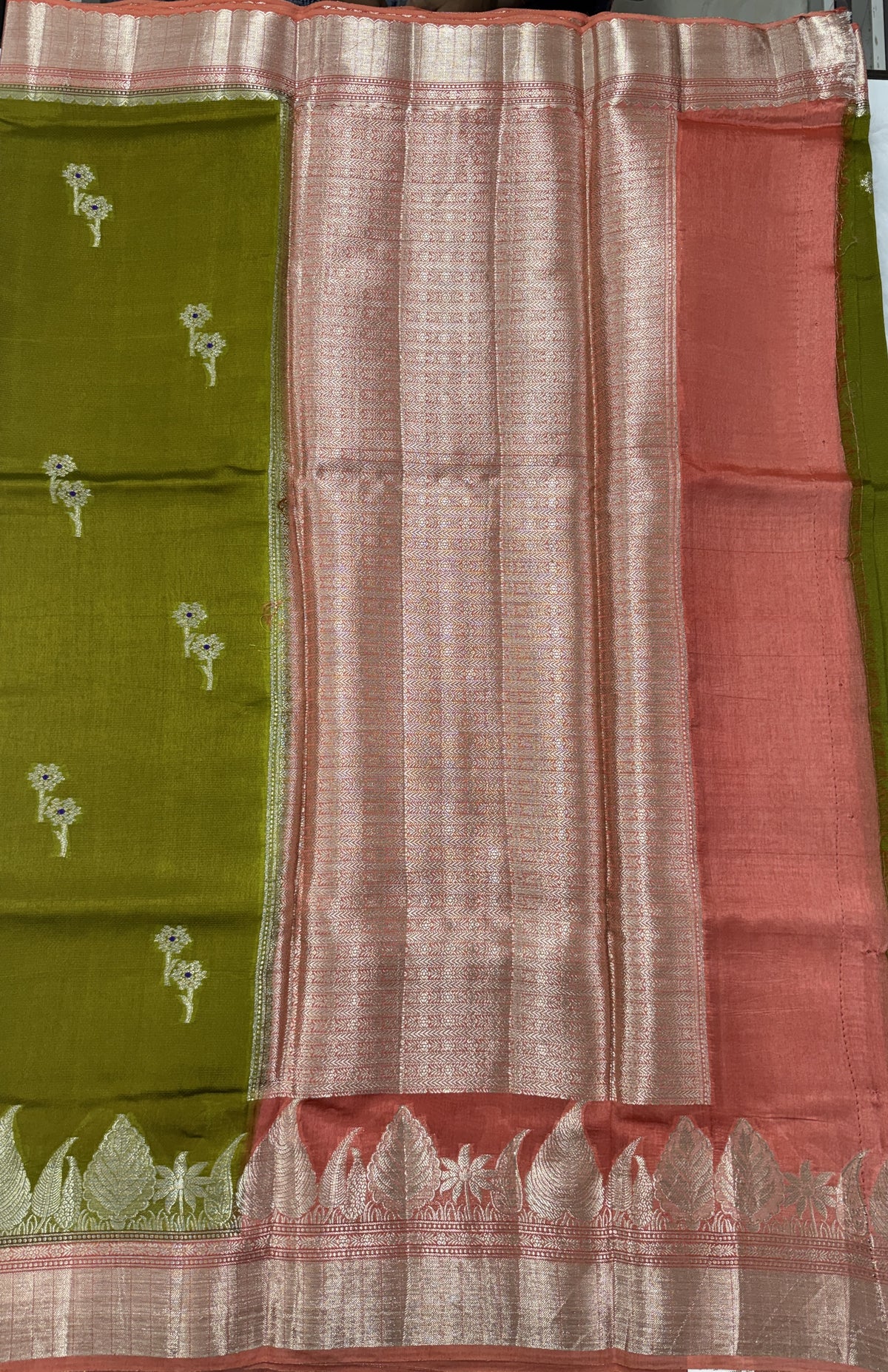 Pure Chiniya Silk Saree Mehandi Colored Elegantly Paired with a Gold Zari Border.