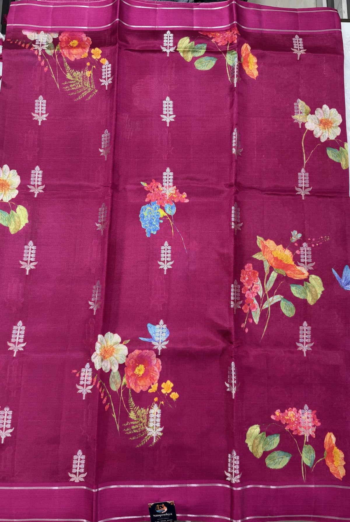 Pure Chiniya Silk Saree Rani Pink Colored Elegantly Paired with a Gold Zari Border.