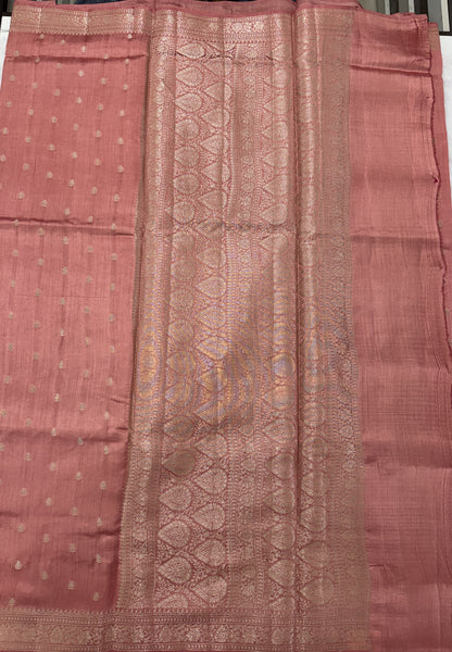 Pure Chiniya Silk Saree Peach Colored Elegantly Paired with a Gold Zari Border.