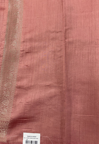 Pure Chiniya Silk Saree Peach Colored Elegantly Paired with a Gold Zari Border.