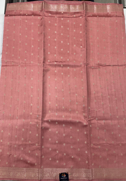 Pure Chiniya Silk Saree Peach Colored Elegantly Paired with a Gold Zari Border.