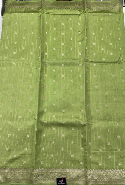 Pure Chiniya Silk Saree Apple Green Colored Elegantly Paired with a Gold Zari Border.