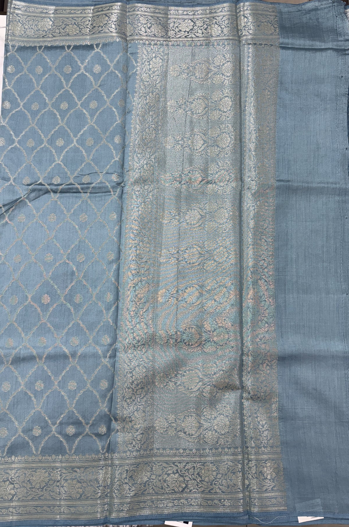 Pure Chiniya Silk Saree Ice Blue Colored Elegantly Paired with a Gold Zari Border