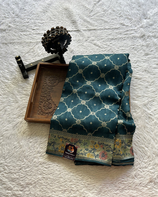 Banarasi Tussar Georgette Saree Peacock Blue Colored Complemented with a Minakari border. - Sampradaya Designer Studio