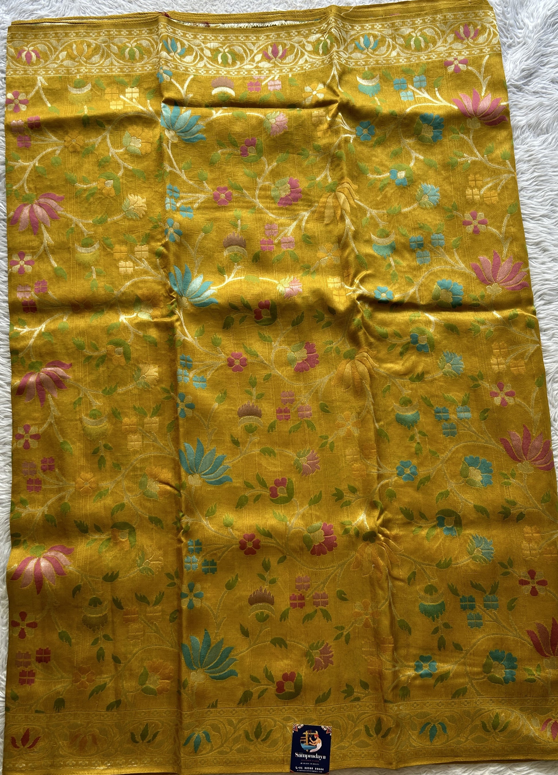 Banarasi Tussar Georgette Saree Mustard Colored Complemented with a Minakari border. - Sampradaya Designer Studio