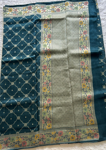 Banarasi Tussar Georgette Saree Peacock Blue Colored Complemented with a Minakari border. - Sampradaya Designer Studio