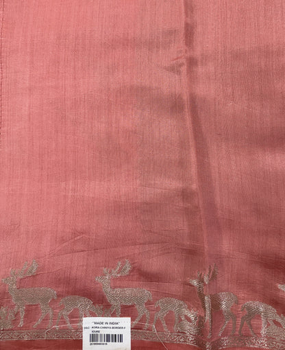 Pure Chiniya Silk Saree Peach Colored Elegantly Paired with a Gold Zari Border.