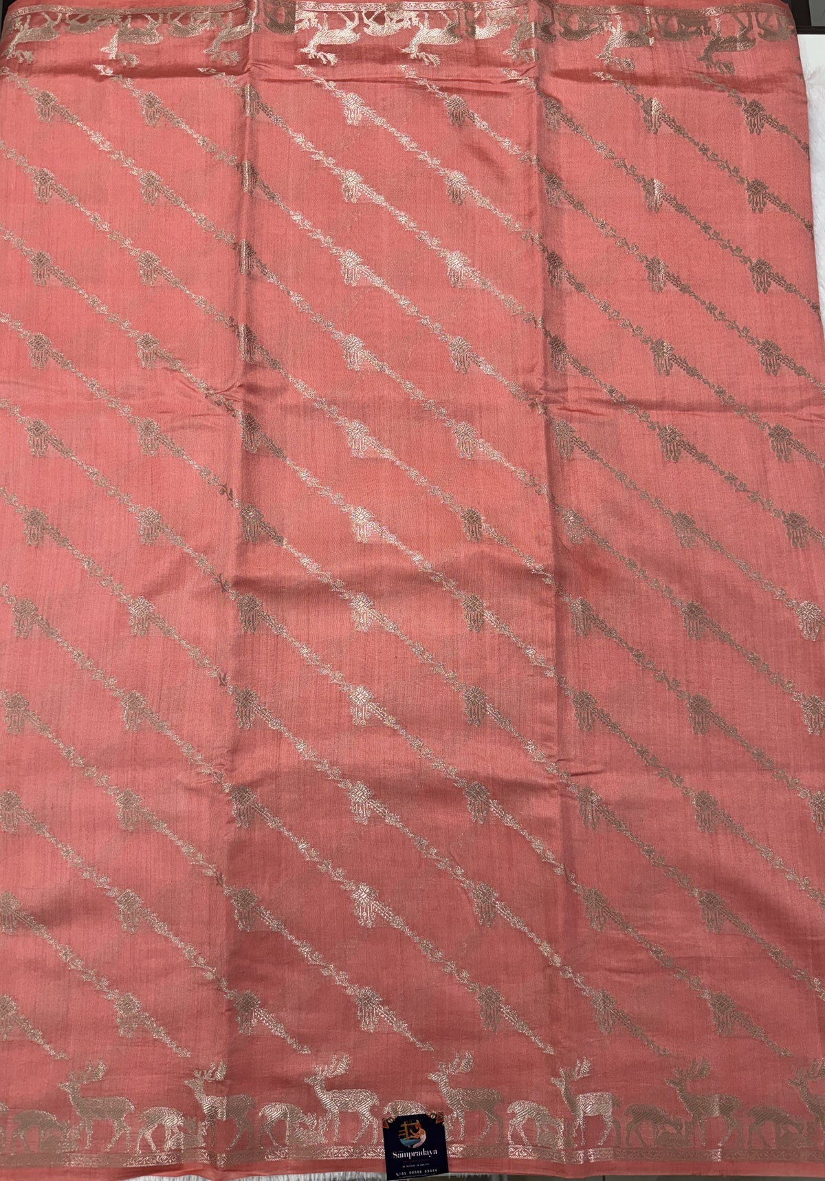 Pure Chiniya Silk Saree Peach Colored Elegantly Paired with a Gold Zari Border.