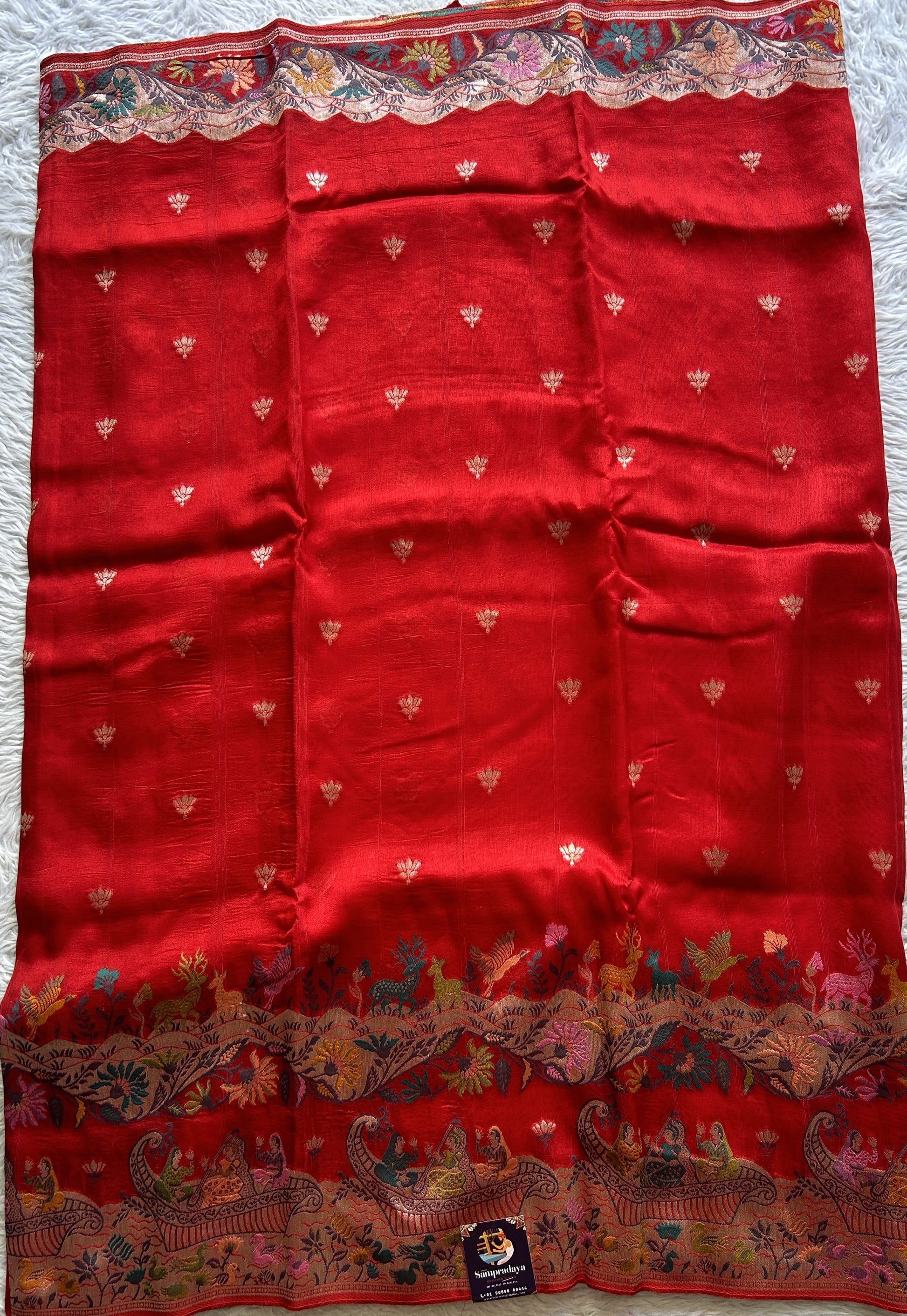 Banarasi Tussar Georgette Saree Red Colored Complemented with a Minakari border. - Sampradaya Designer Studio