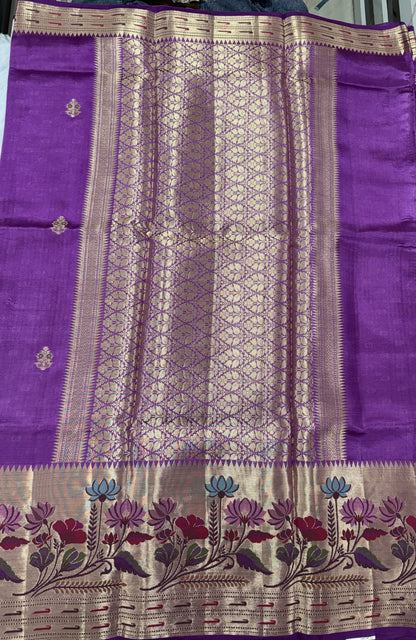 Pure Chiniya Silk Saree Striking Purple Colored Elegantly Paired with a Gold Zari Border.