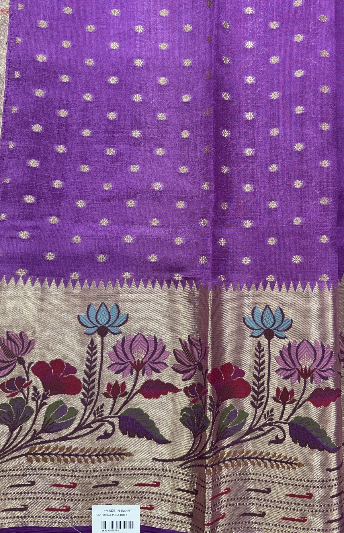 Pure Chiniya Silk Saree Striking Purple Colored Elegantly Paired with a Gold Zari Border.