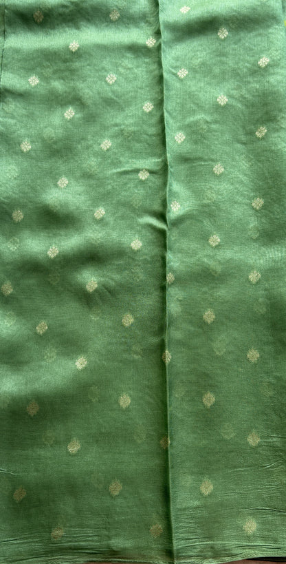Banarasi Tussar Georgette Saree Sea Green Colored Complemented with a Minakari border. - Sampradaya Designer Studio