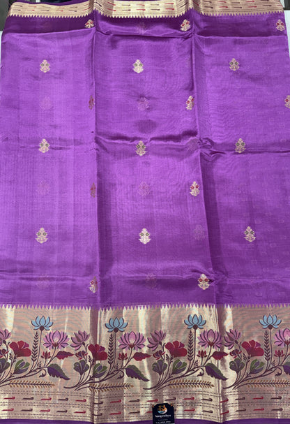 Pure Chiniya Silk Saree Striking Purple Colored Elegantly Paired with a Gold Zari Border.