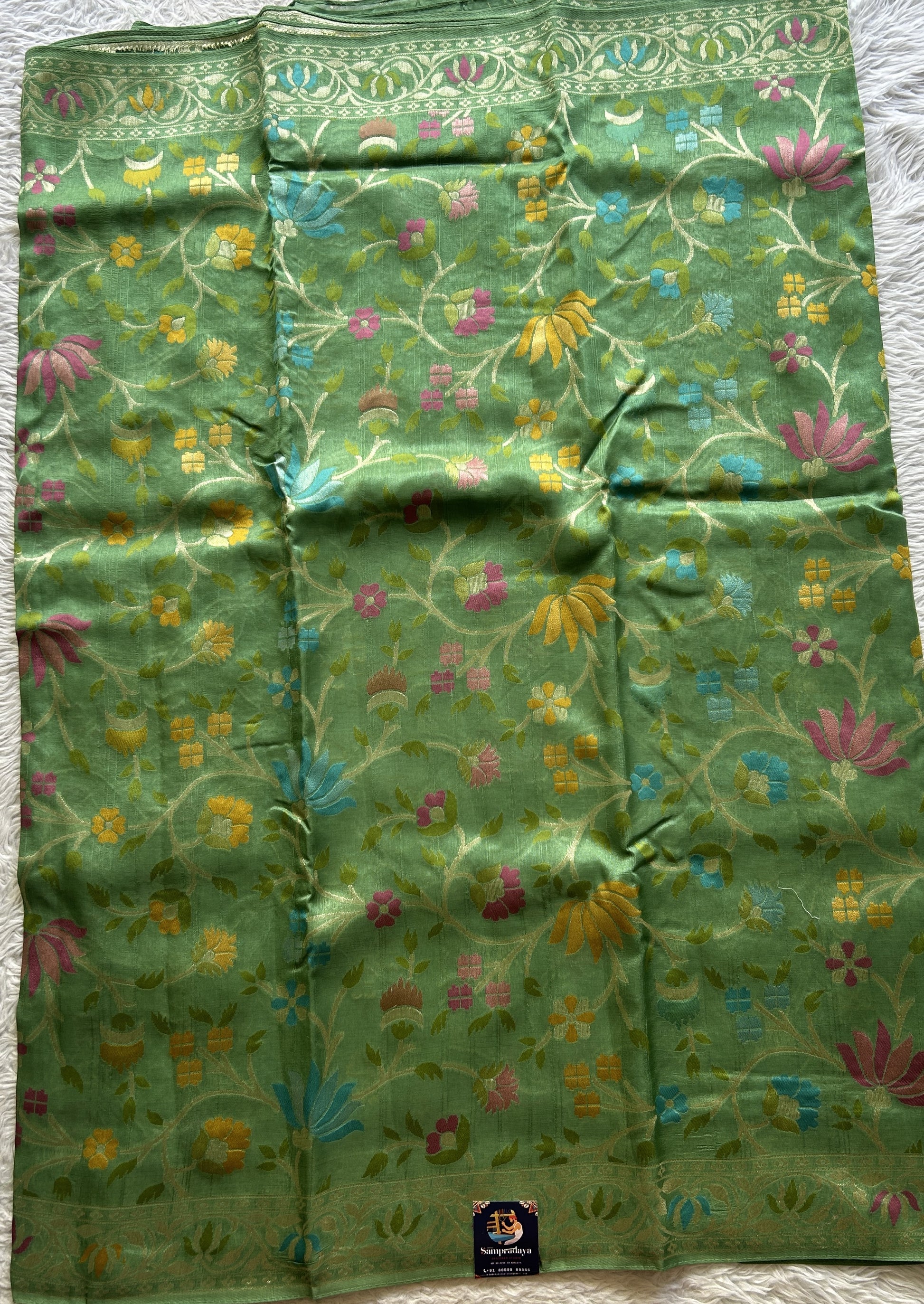 Banarasi Tussar Georgette Saree Sea Green Colored Complemented with a Minakari border. - Sampradaya Designer Studio