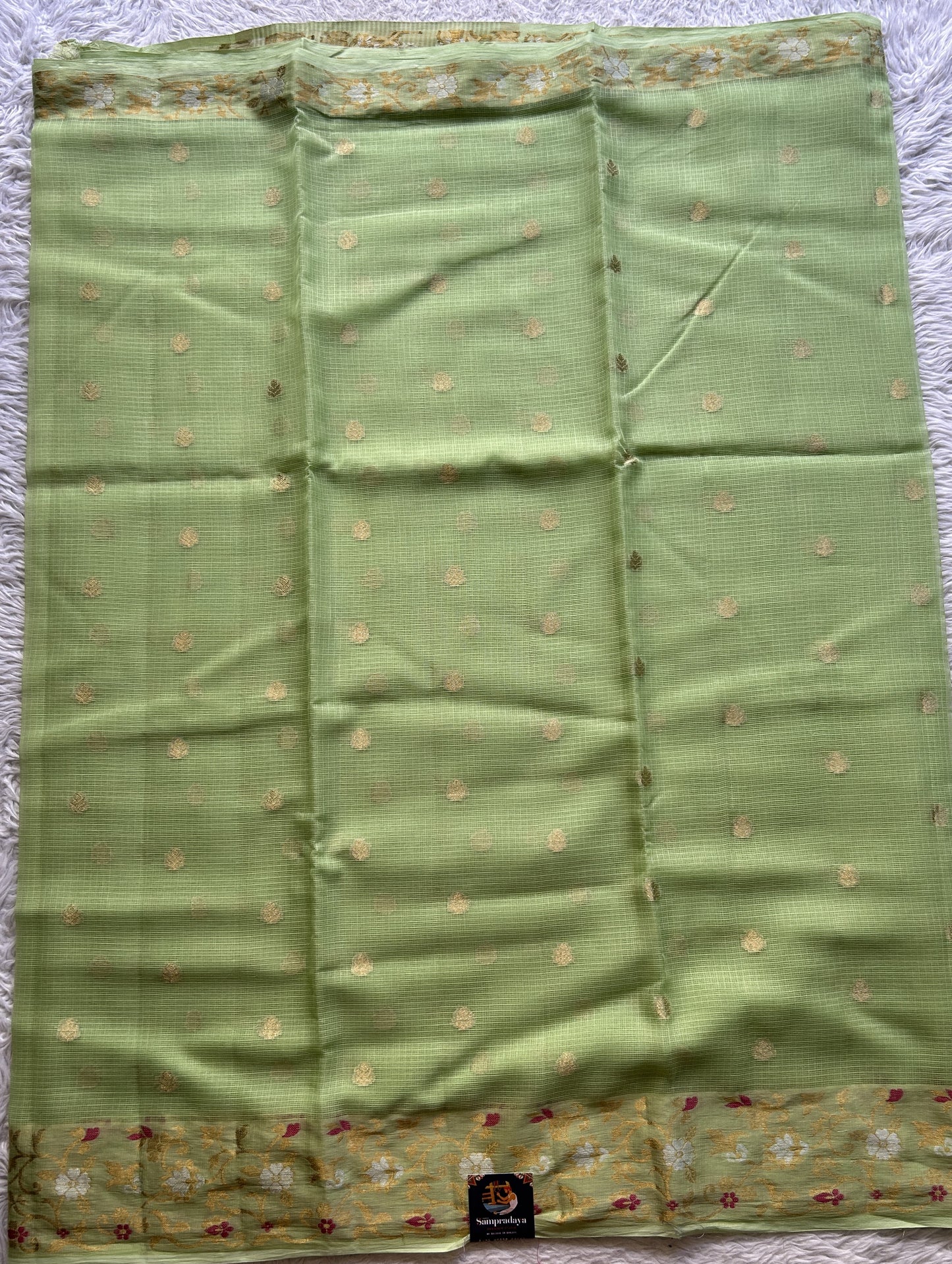 Silk kota Saree Apple Green colored Complemented with a Zari Border. - Sampradaya Designer Studio