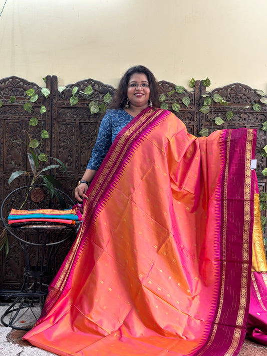 Gadwal Silk Saree Orange Colored Complemented With a Zari Border. - Sampradaya Designer Studio