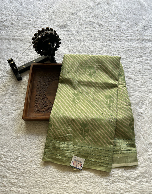 Semi Tussar Saree Corn Green Colored complemented with a Running Stich Border. - Sampradaya Designer Studio