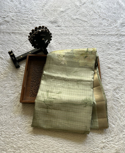 Semi Tussar Saree Mint Colored complemented with a Zari Border. - Sampradaya Designer Studio